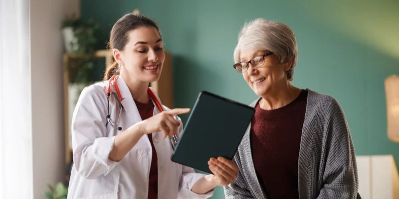 angioplasty-procedure-near-me-doctor-and-patient-reviewing-artery-scans